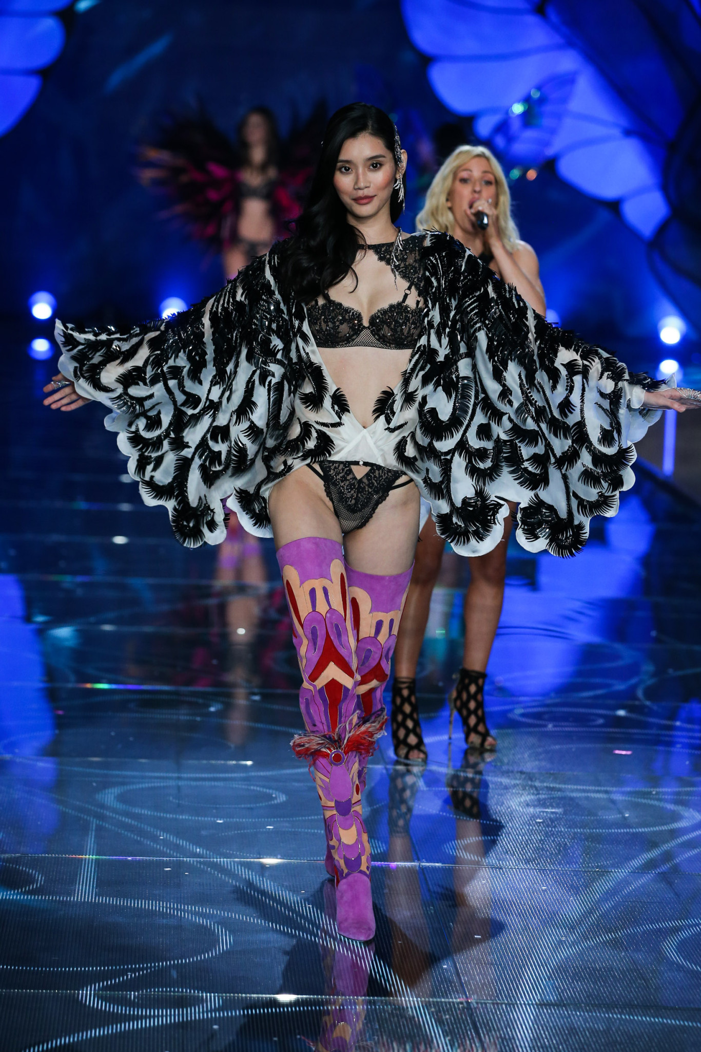 Model Ming Xi walks the runway at the 2015 Victoria's Secret Fashion Show in New York City on November 10th, 2015